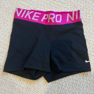 Black and pink Nike pro spandex